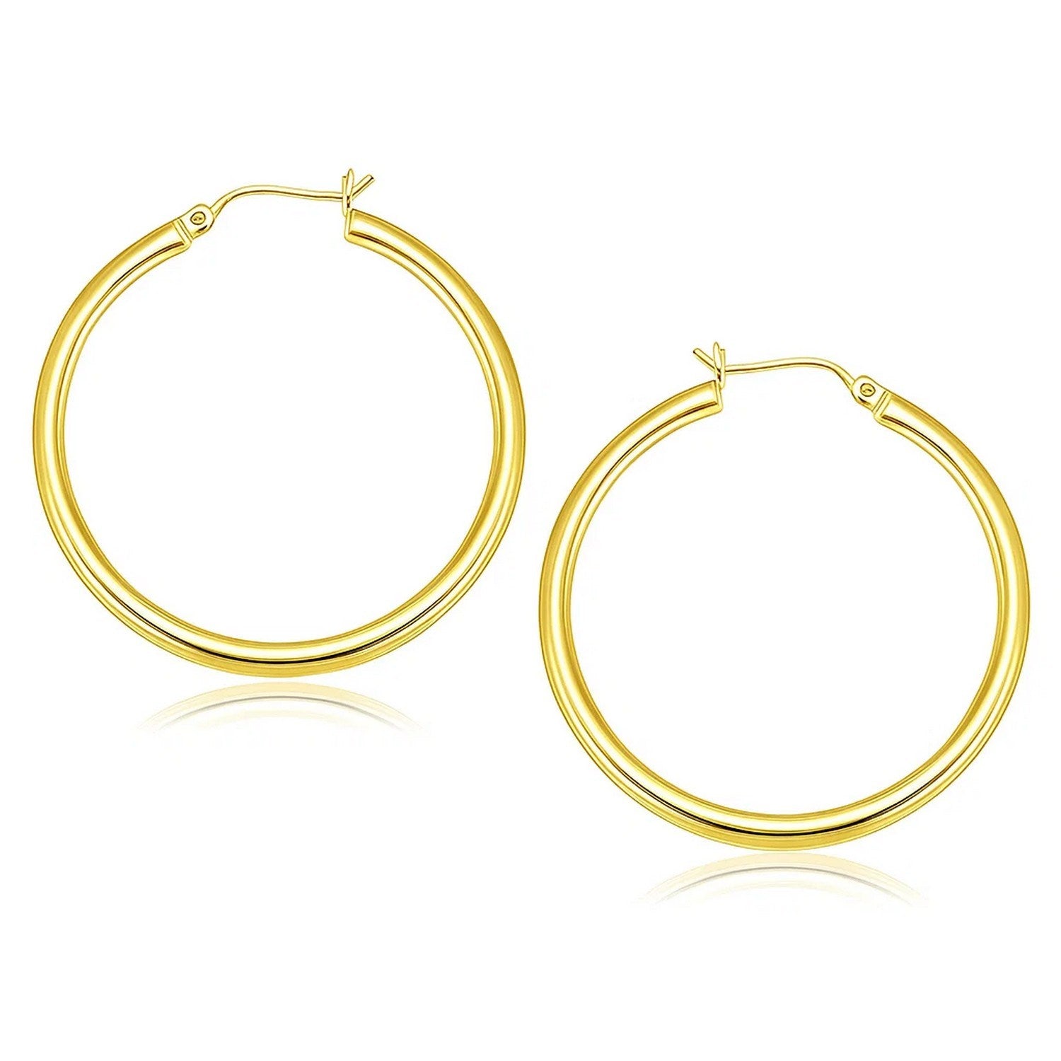 14k Yellow Gold Polished Hoop Earrings (3x40mm) in a sleek high-contrast midnight luxury editorial style